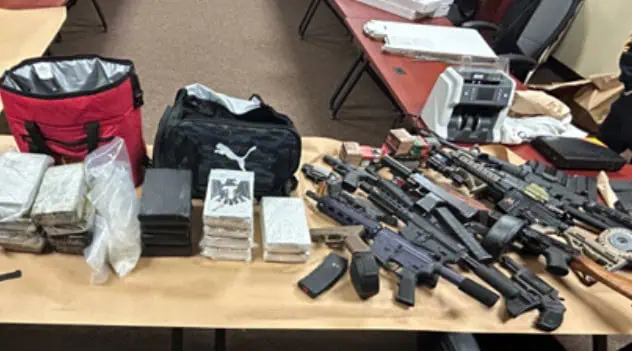 Sanford Man Convicted After Feds Find Machine Guns and 18 Kilos of Cocaine Hidden in Junk Cars